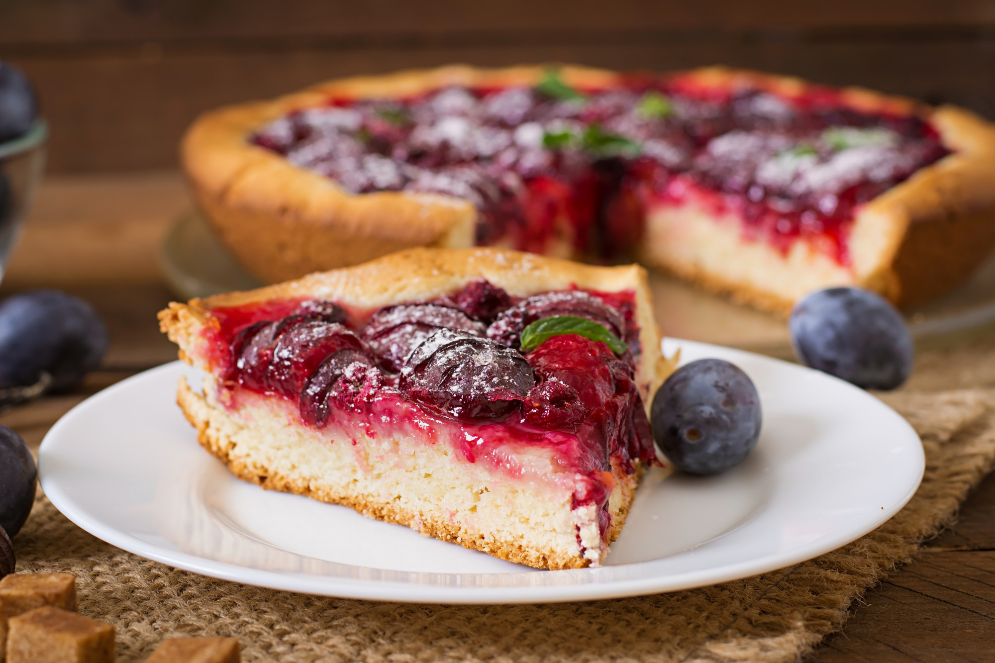slice of pie with berries on top